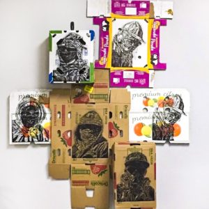 An art piece with multiple boxes, colors, and faces.