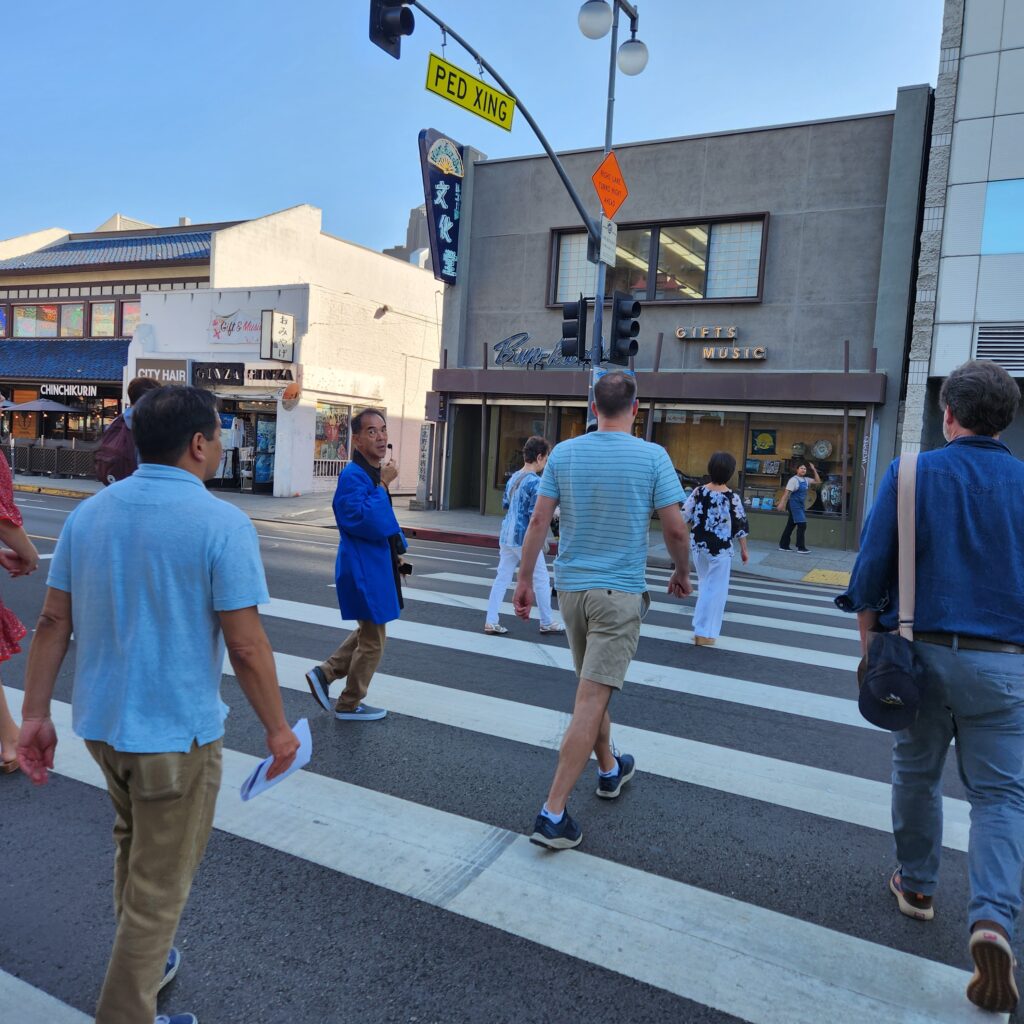 People walking across a crosswalk