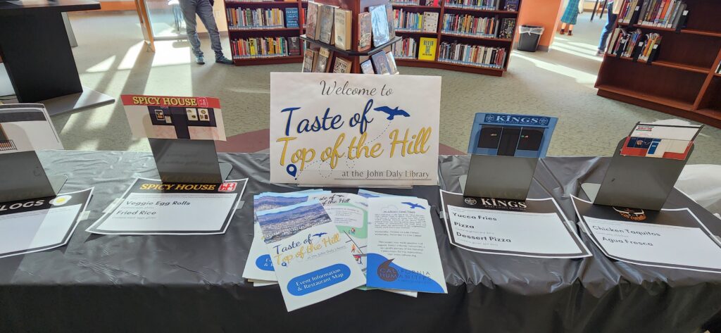 Taste of the Top of the Hill signage inside the Daly City Public Library