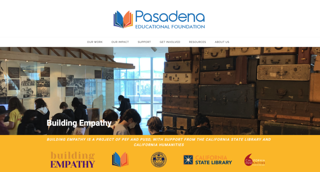 Screenshot of a website landing page, with image of students inside a museum exhibit, and yellow block banner with partner logos including California Humanities.