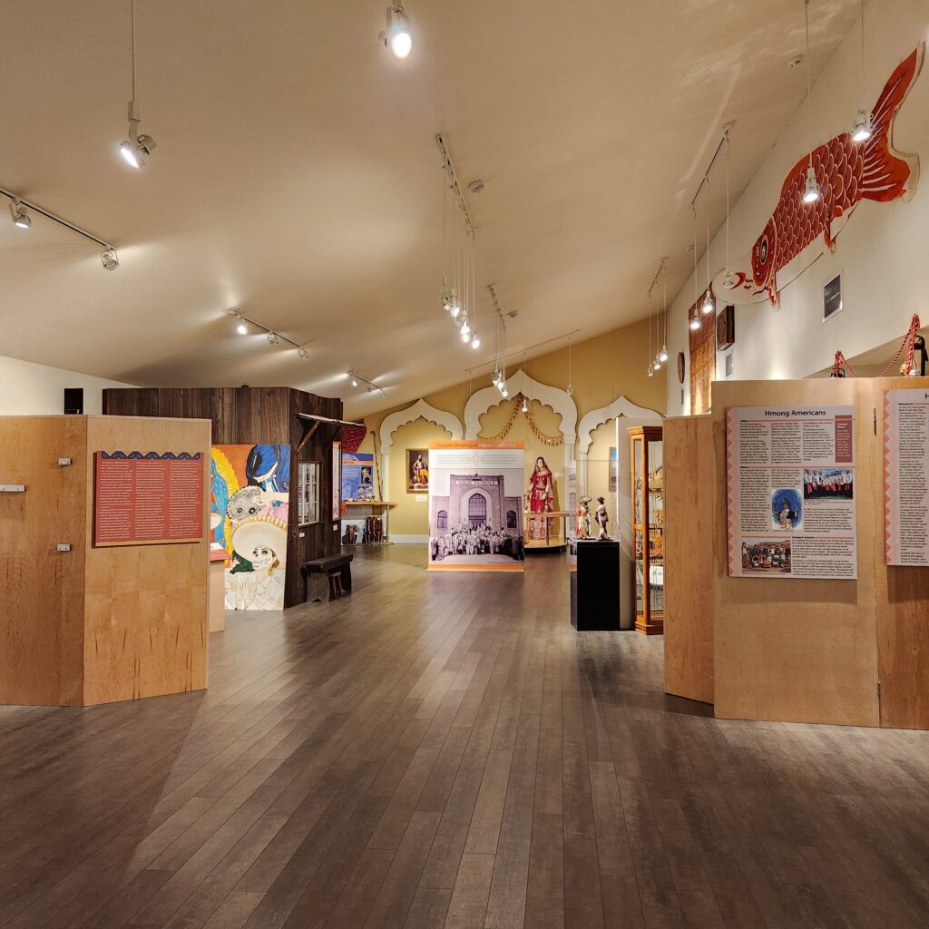 View into a museum exhibit gallery with various displays.