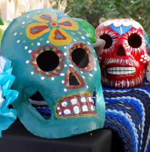 Close up of colorful sugar skulls on a table