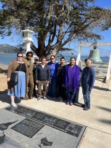 California Humanties Staff rom left to right Marika Garcia, Shonda Moore, Elisa Kutza, Rick Noguchi, Jessica Rincon, Zuriel Ortiz, and mariana moscoso pictured with Edward Tepporn, Executive Director of the Angel Island Immigration Station Foundation