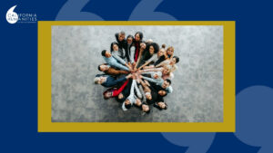 Photo of people in a circle looking up